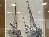 framed drawing of a pair of sailboats on the beach