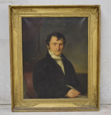 portrait of a man in a black coat with a white collar