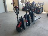 a picture of a group of electric pallets in a garage