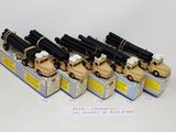 several toy military vehicles are lined up on top of each other