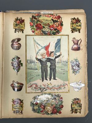 un livre sur lequel figurent deux garçons, dont l'un tient un drapeau