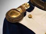 an image of a military uniform with buttons on the collar