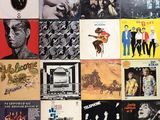 a lot of records on the wall of a room