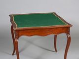 pair of small side tables with green tops