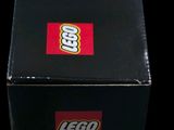 a black box with a picture of a lego character on it