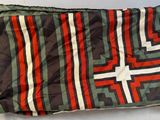an image of a blanket with a cross on it