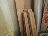 several pieces of cardboard are stacked on top of each other in a room