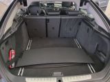 a trunk of a car with the back seats folded down