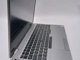 a close up of a laptop computer on a table