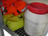 a white container with a red lid sitting inside of a refrigerator