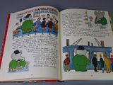 an open book with a picture of a cartoon character on it