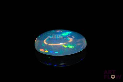 an image of a black oplite in the dark