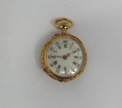 an antique gold pocket watch with roman numerals and roman numerals on the face