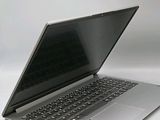 a laptop computer sitting on top of a white table