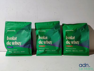 three bags of coffee sit on a table next to each other