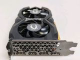 a close up of a video card with a fan on top of it