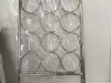 a picture of a wine rack in plastic wrapped in plastic