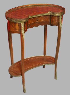 an image of a wooden table with a red leather top