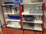 many shelves with various items on them in a room