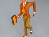 a figurine of a man in a suit and tie holding a suitcase