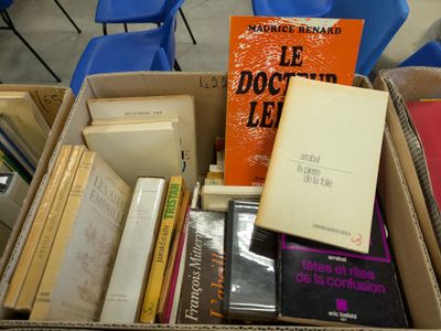 a box full of books sitting on a table