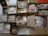 many boxes of assorted items sitting on a table