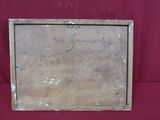 an old picture frame on a red cloth with a red background