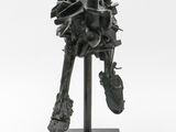 an image of a sculpture of a robot on a stand