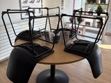 a table with four laptops on it in a room