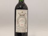 a bottle of wine that is sitting on a table