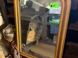 a picture of a mirror that is sitting on the floor