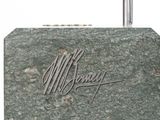 an image of a close up of a suitcase with a name engraved on it
