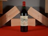 a bottle of wine that is sitting on a table