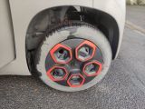 a close up of a tire on the side of the road