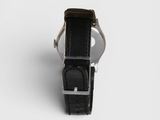 an image of a close up of a watch on a white surface