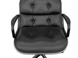 a black office chair with a chrome steel base and black leather upholstered seat
