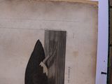 an old picture of a man leaning against a tree