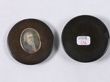 pair of miniature portraits of a gentleman and a woman in a black case
