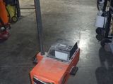 a machine that is sitting on a stand in a garage