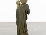 statue of a man holding a child in his arms