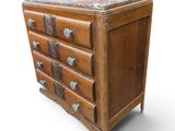 an old wooden chest of drawers with marble top on a white background