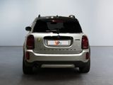 a silver car that is parked in a room