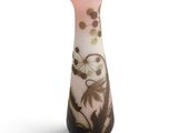 a vase with a floral design on it on a white background