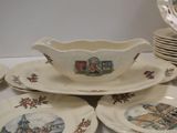 many plates and bowls that are sitting on a table