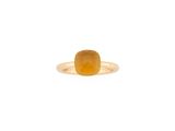 a gold ring with a yellow stone in the middle