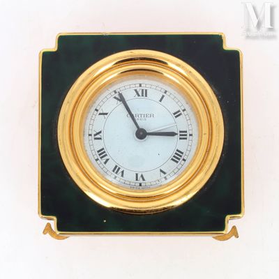 a clock with roman numerals on the face of it