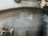 a close up of a metal sink with a faucet on it