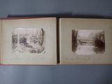 an old photo of a book opened to show a picture of a bridge