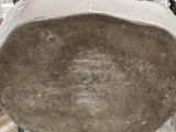 a close up of a bowl on a rack in a store