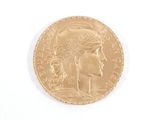an image of a gold coin with a woman ' s face on it